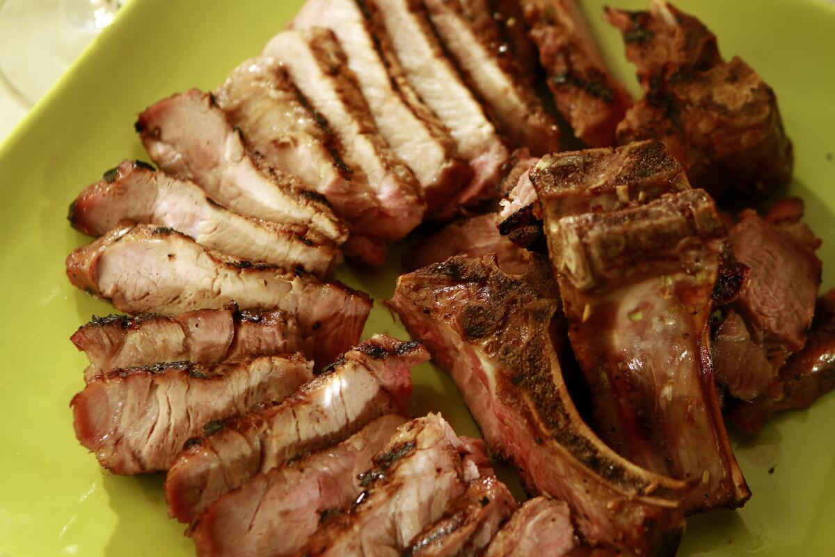 Pork chops are marinated in a sweet lemongrass sauce then grilled.