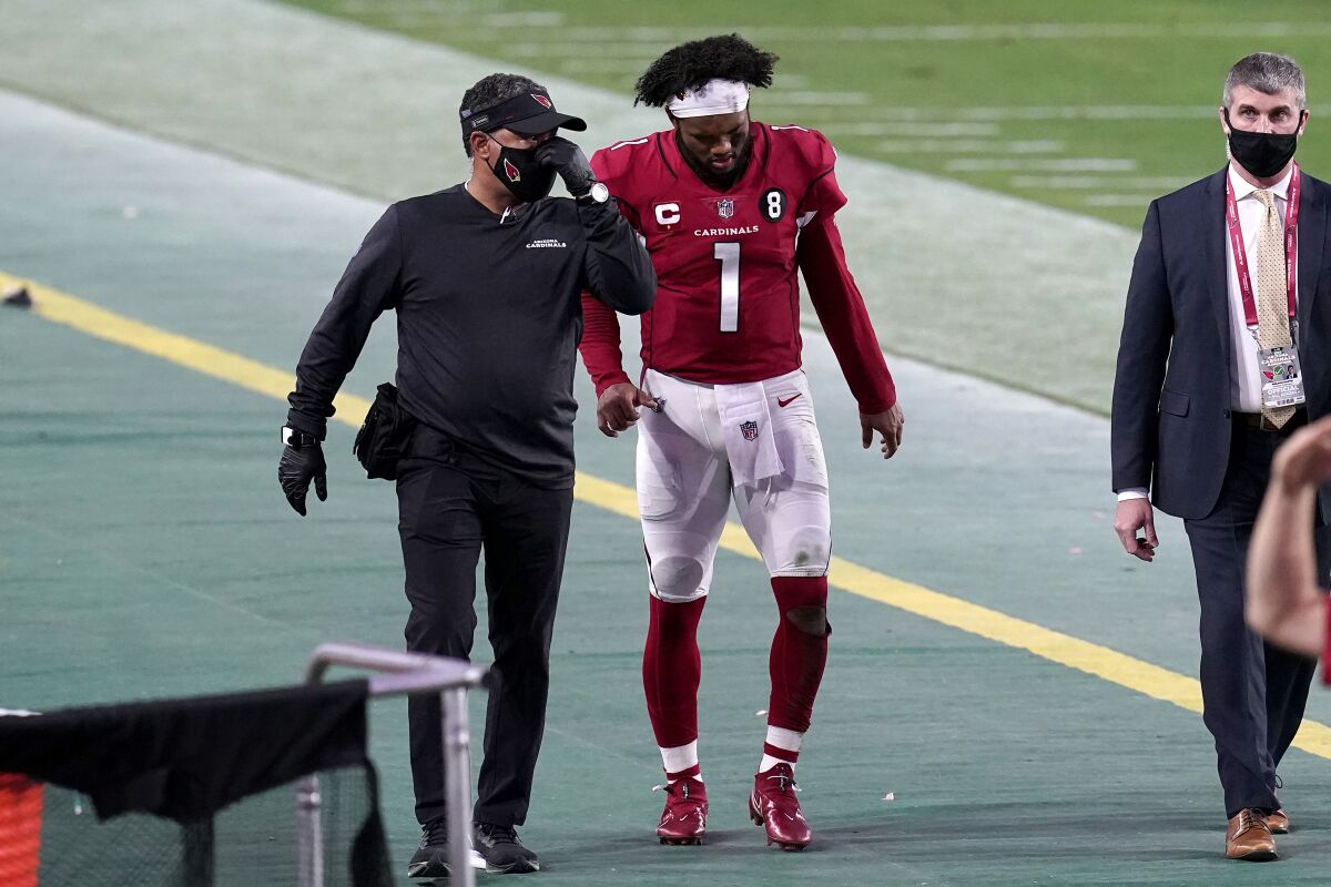 Arizona Cardinals quarterback Kyler Murray leaves the field injured after a loss to the San Francisco 49ers on Dec. 26, 2020.