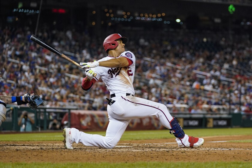 The Nationals' Juan Soto bats during a game against the New York Mets.