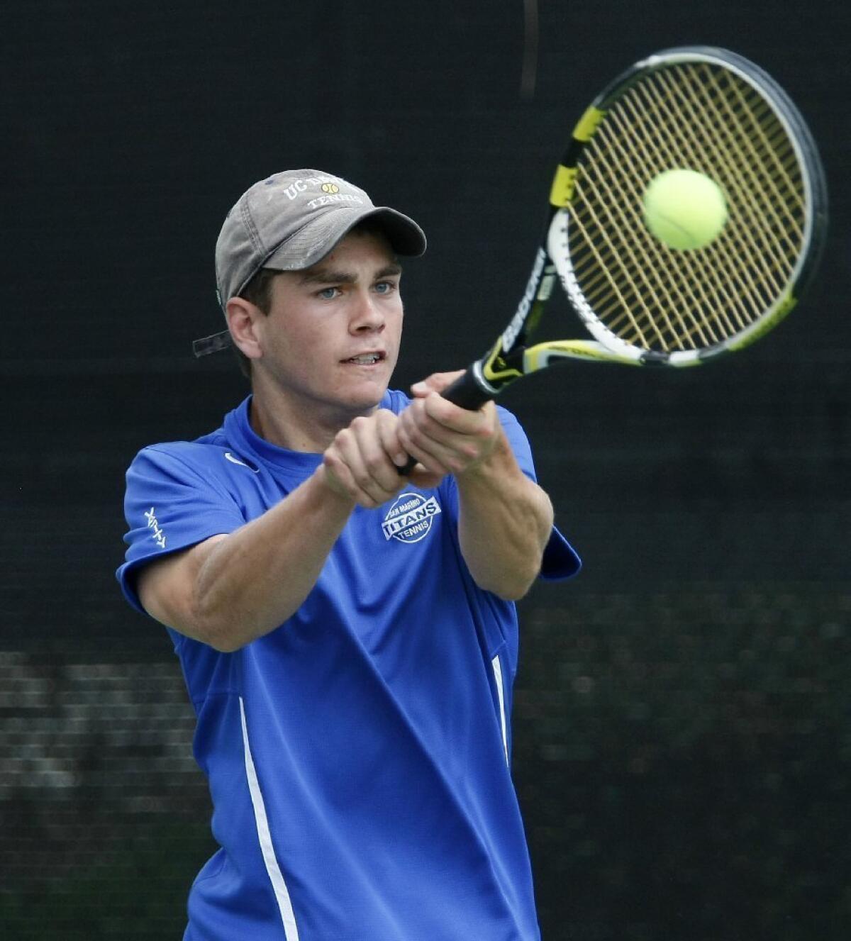 James Wade kept the San Marino High boys' tennis team's season alive with a clutch victory over Palm Desert in the CIF/United States Tennis Assn. South Regional semifinals.