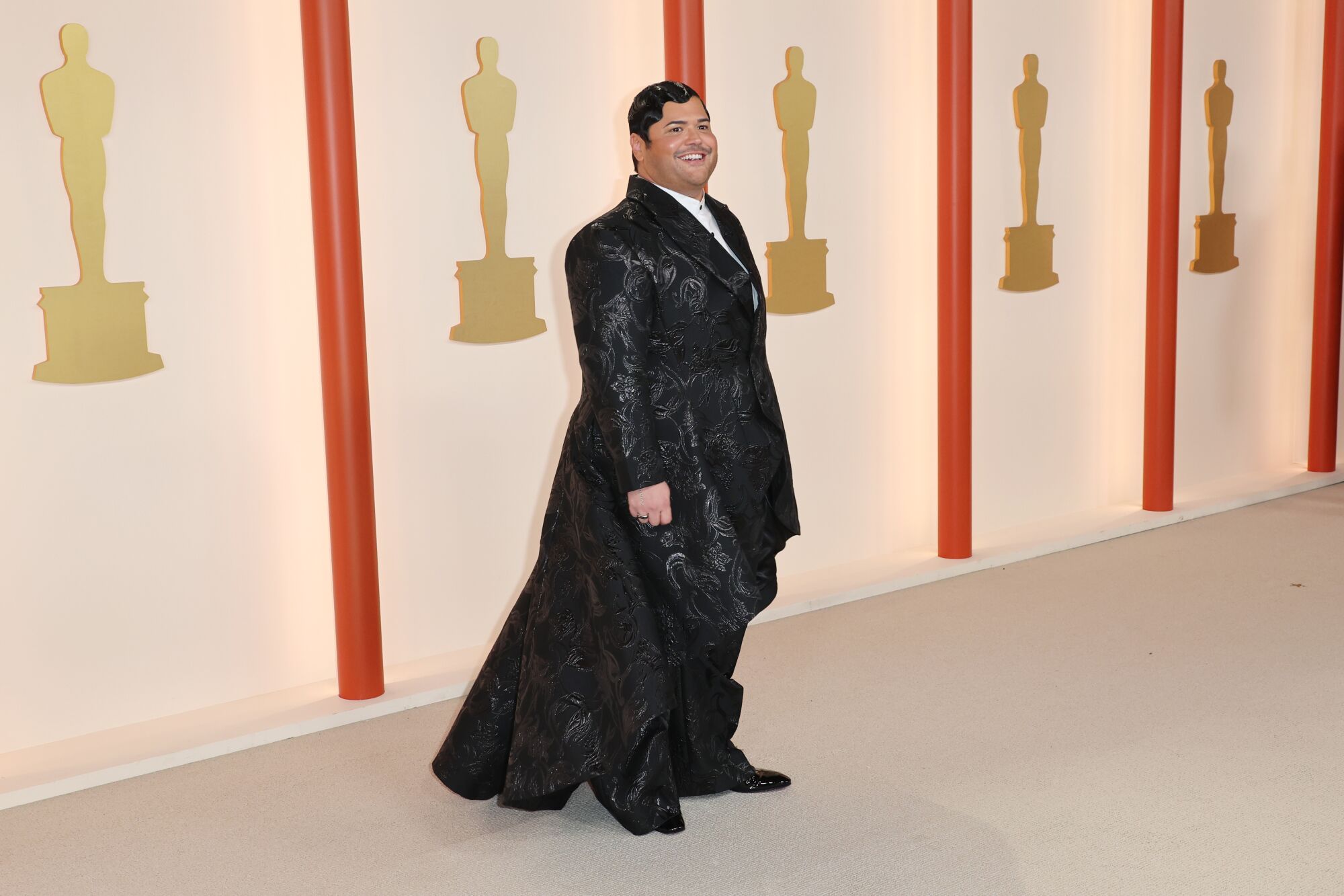Harvey Guillén in Christian Siriano on the Oscars 2023 red carpet.