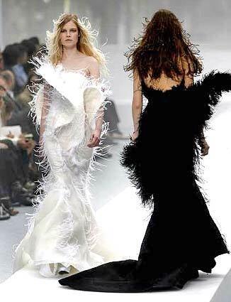 NINA RICCI: Olivier Theyskens brought a younger vibe to the venerable house, even weaving ostrich feathers into ball gowns.