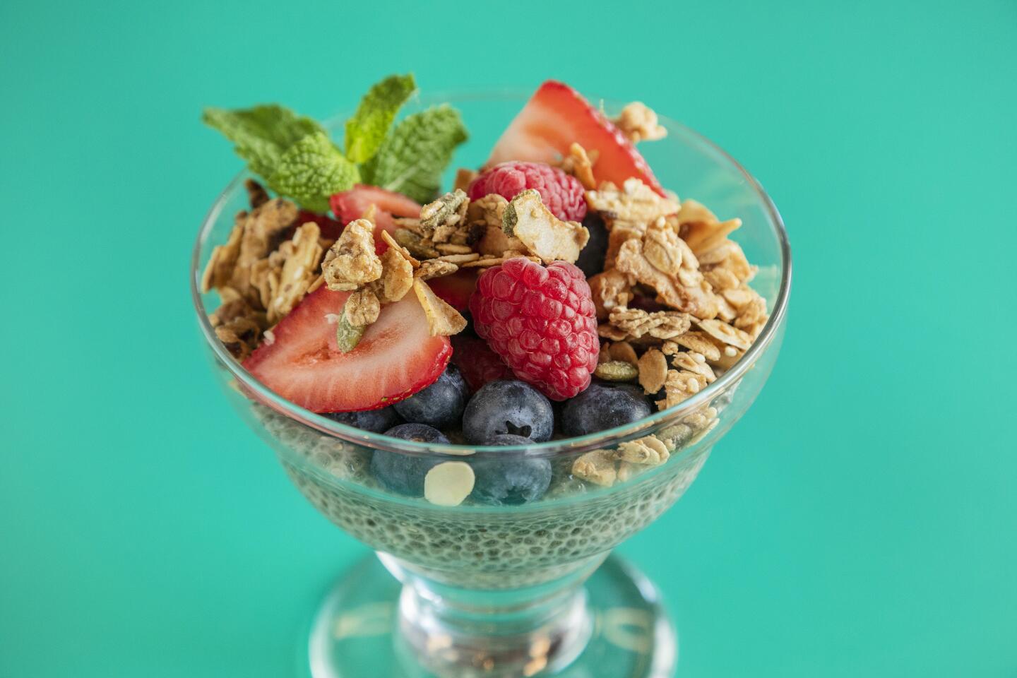 SANTA MONICA, CA - OCTOBER 21, 2019 - Breakfast granola: Sweet housemade granola (smaller bowl) - oat milk yogurt or straus yogurt with chia passion fruit and berries, at Socalo, a soon to be open Mexican restaurant in Santa Monica, October 21, 2019. (Ricardo DeAratanha / Los Angeles Times)