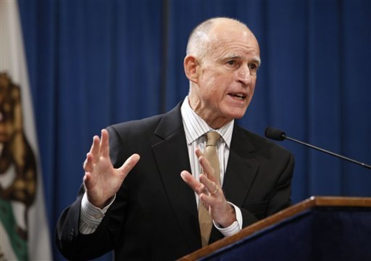 Gov. Jerry Brown speaks about shortfalls in the state budget during a news conference at the Capitol in Sacramento, Calif., on Tuesday, Dec. 13, 2011. Brown said that California needs to make about $1 billion in midyear cuts to schools and social services, as the state's revenues fell about $2.2 billion below the assumptions included in the budget he signed last summer.(AP Photo/Steve Yeater)