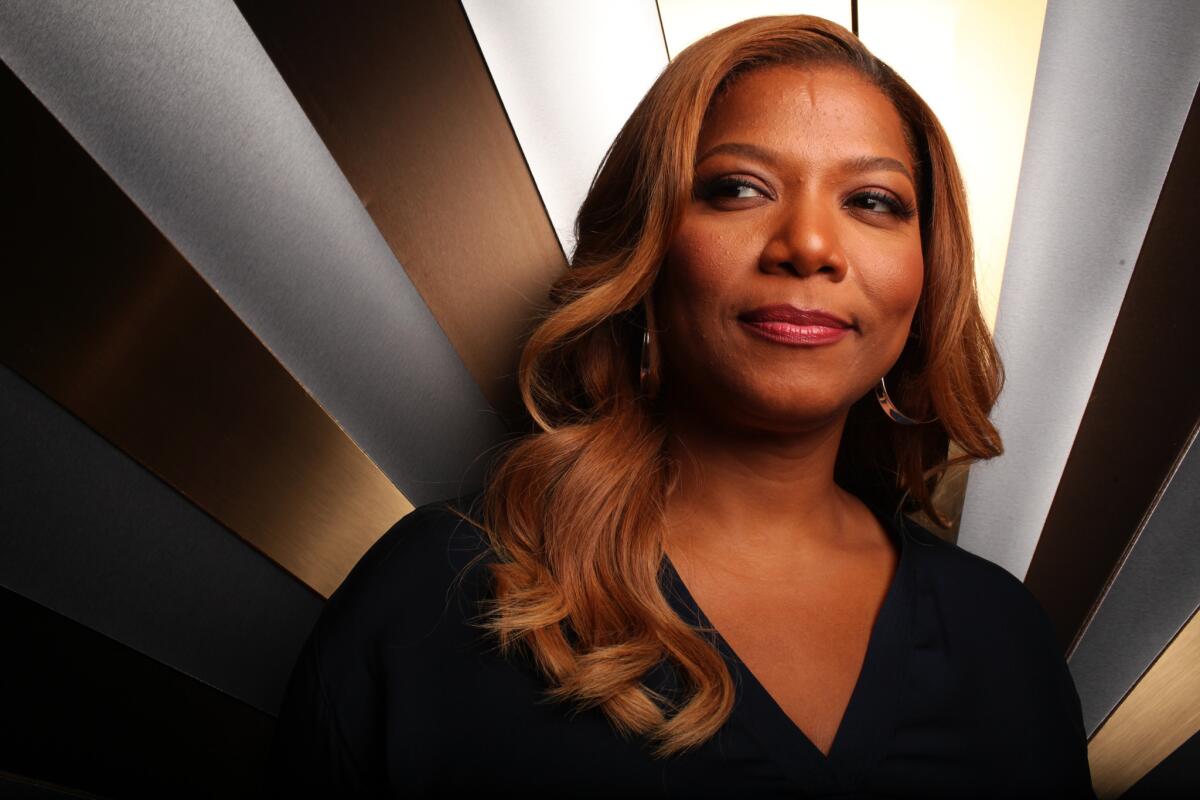 Queen Latifah on the set of "The Queen Latifah Show." BET's Centric will air the talk show in prime time and has also picked up the VH1-canceled "Single Ladies," which comes from her production company.