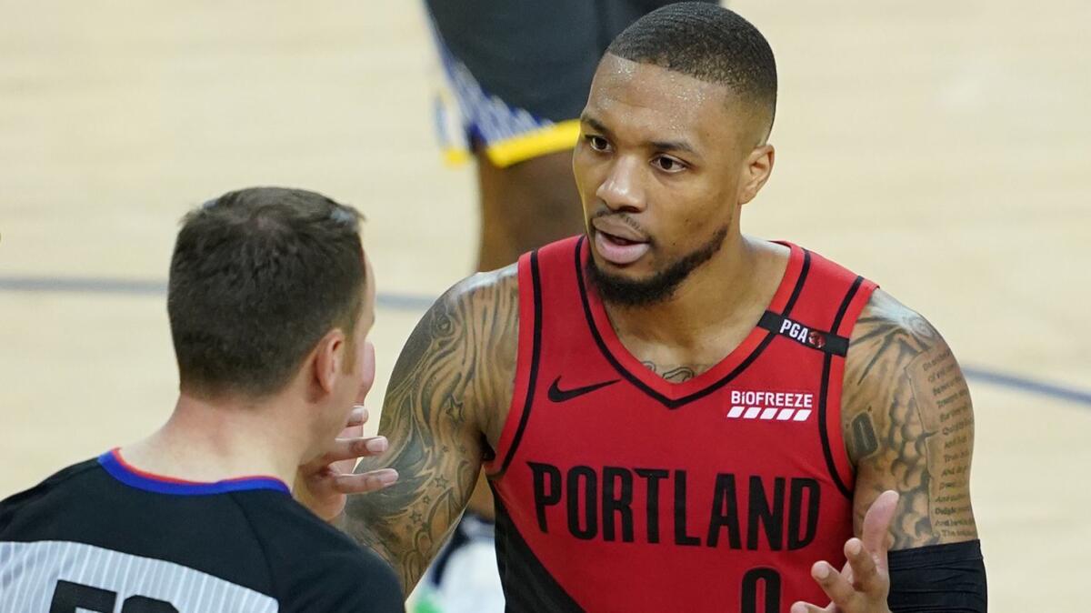 Guard Damian Lillard, speaking to referee Josh Tiven during Game 2, and the Trail Blazers were 32-9 at home in the regular season.