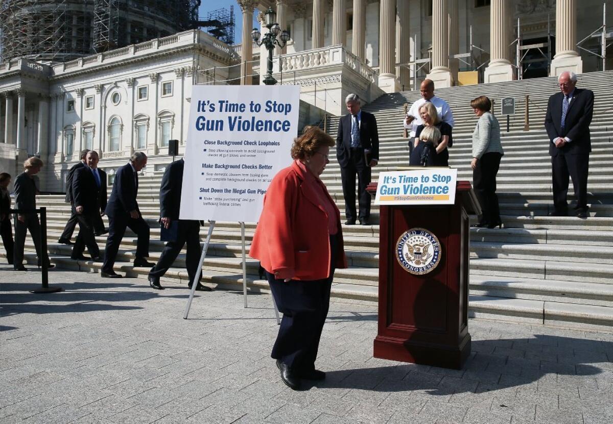 Sen. Barbara Mikulski (D-Md.) joins colleagues at a news conference on gun control at the U.S. Capitol on Oct. 8.