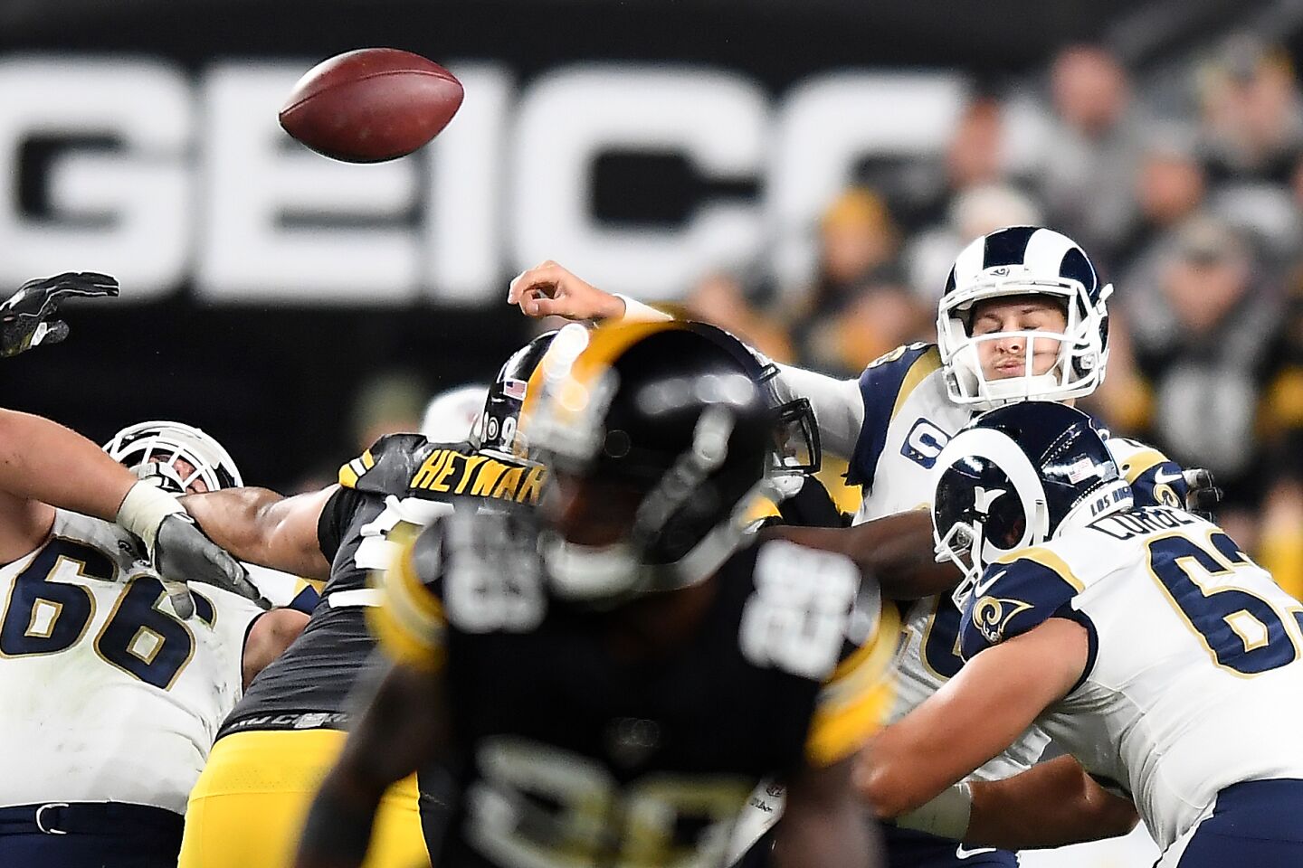 Rams quarterback Jared Goff fumbles the ball
