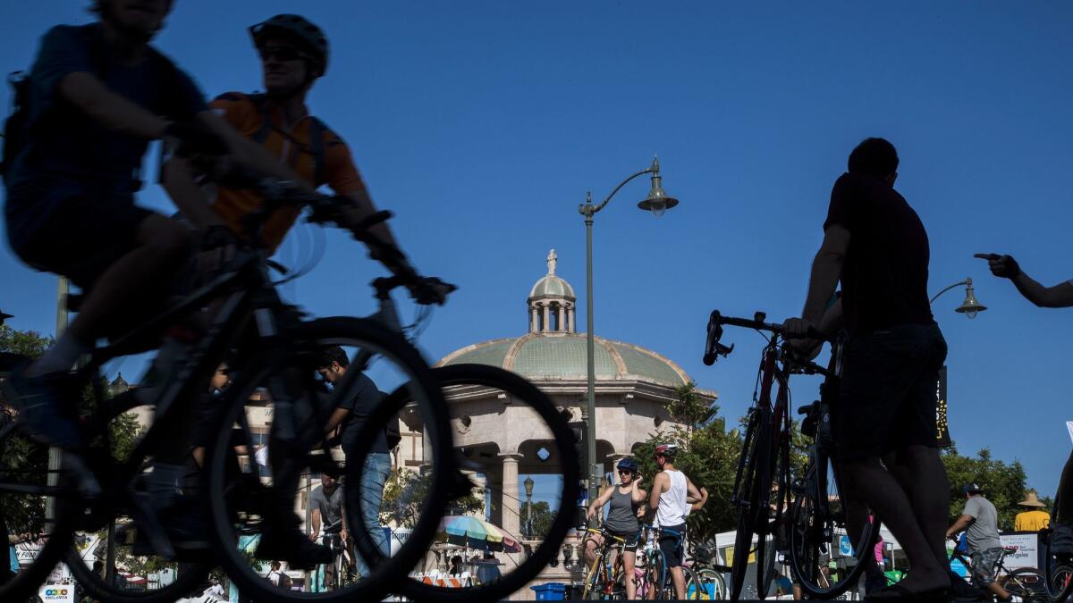Cyclists ride near Mariachi Plaza during the 23rd CicLavia on Sunday.