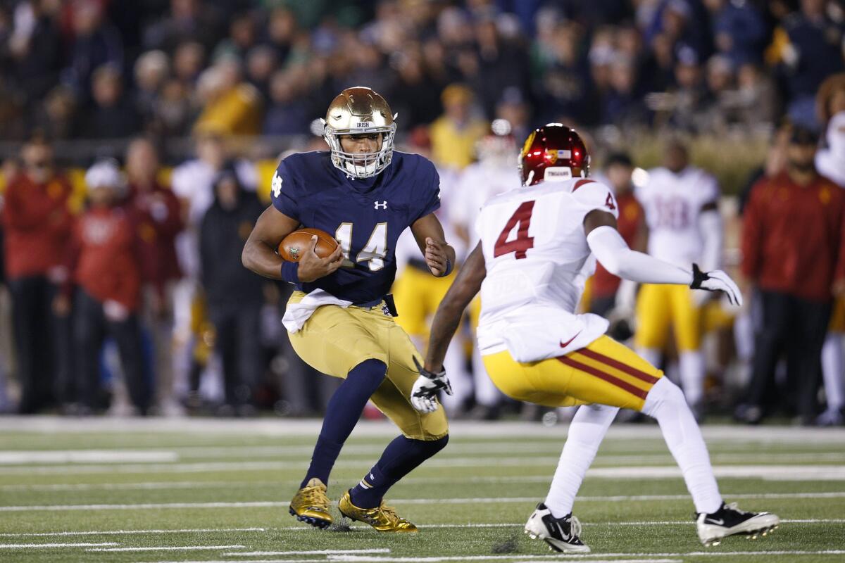 Notre Dame quarterback DeShone Kizer runs the ball against USC during the first half of a game on Oct. 17.