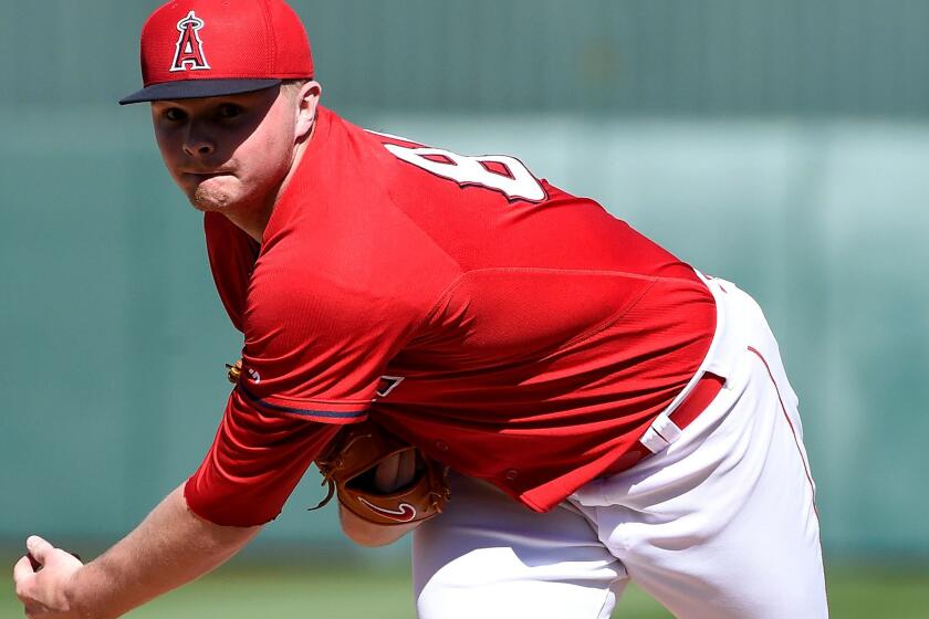 Angels pitcher Sean Newcomb works against the Kansas City Royals during a spring training game on March 8 at Tempe Diablo Stadium.