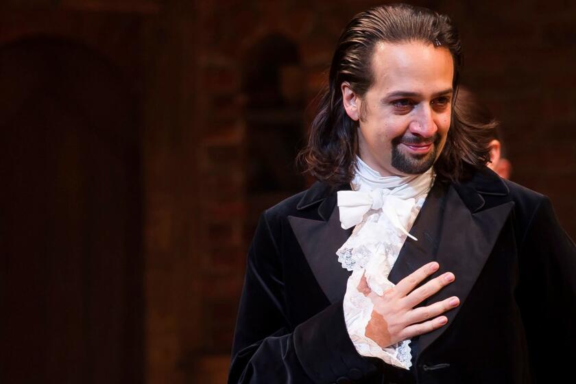FILE - In this Aug. 6, 2015, file photo, Lin-Manuel Miranda appears at the curtain call following the opening night performance of "Hamilton" at the Richard Rodgers Theatre in New York. Miranda has enlisted celebrities to sing lyrics from the musical and post them to social media in order to raise money for a coalition of non-profits focused on immigration. (Photo by Charles Sykes/Invision/AP, File)