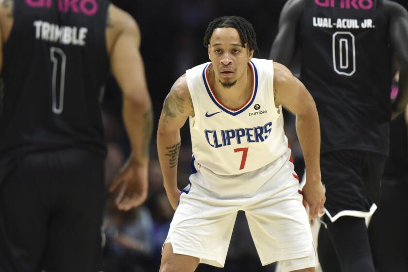 Los Angeles Clippers guard Amir Coffey takes part in an exhibition game.