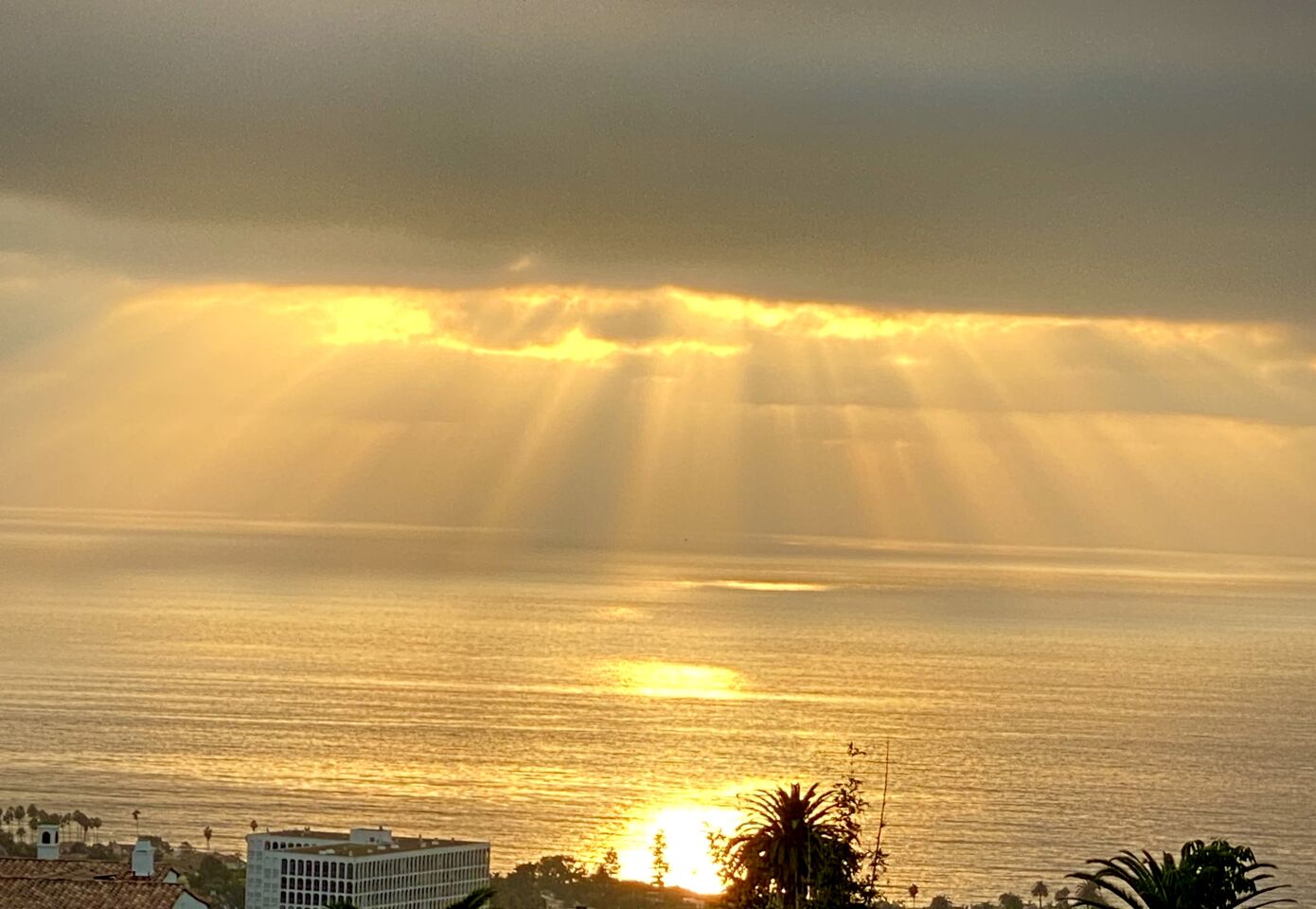 Clouds and sun mix over the ocean off La Jolla.