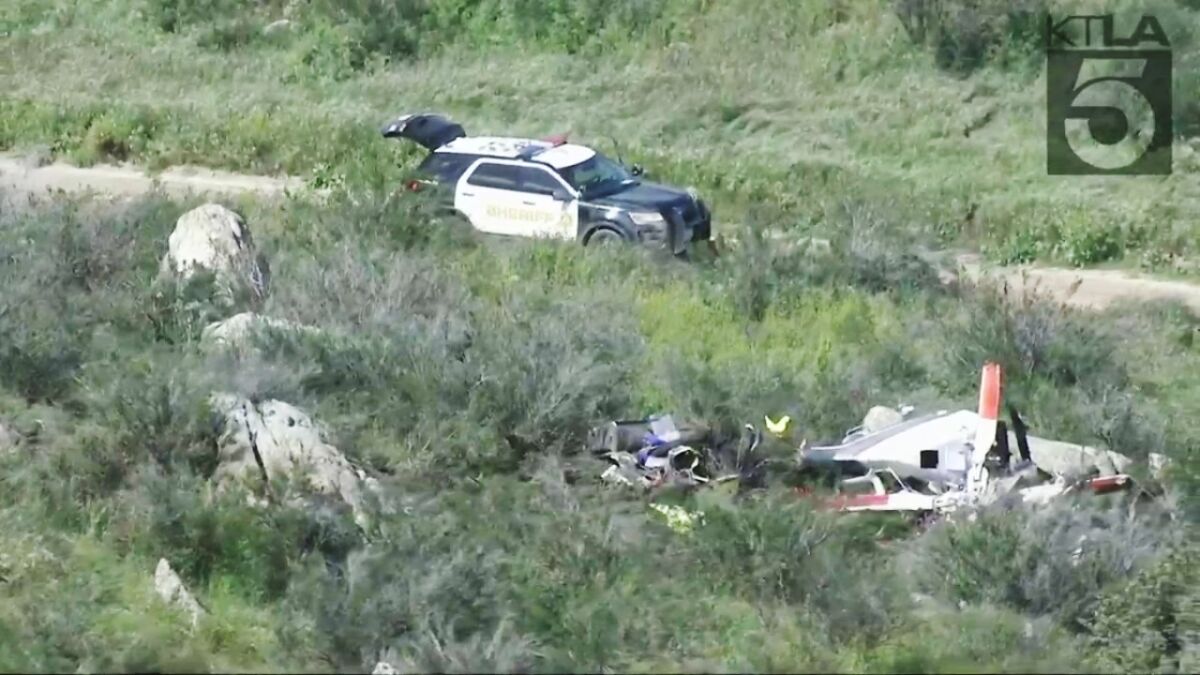 The scene of a helicopter crash that killed two