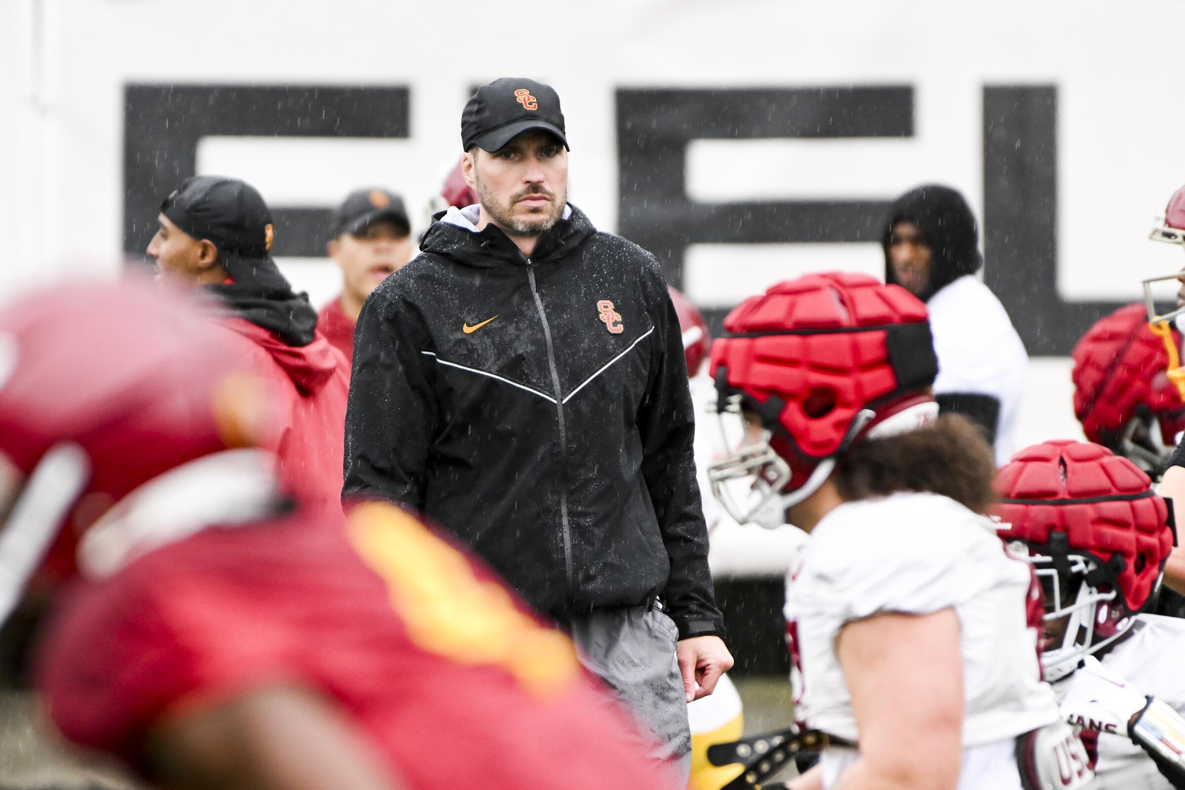 USC defensive coordinator Alex Grinch watches over spring practice in March.