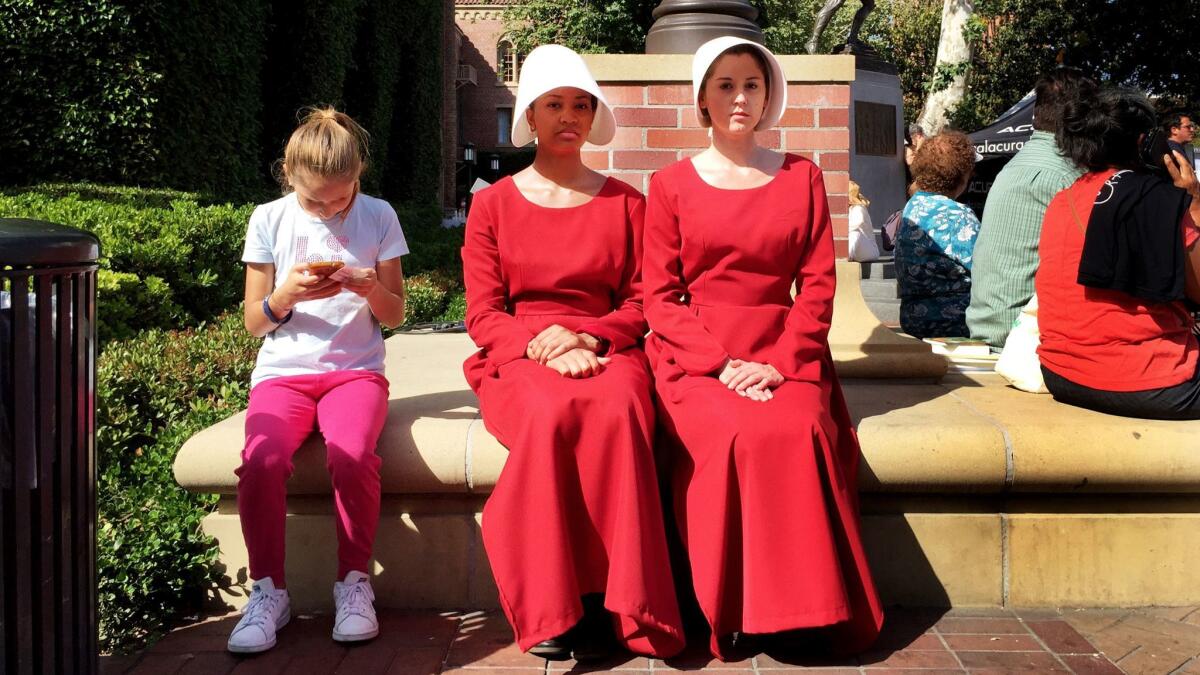 Actresses in costume and character from the Hulu series "The Handmaid's Tale," based on the book by Margaret Atwood, in Los Angeles on April 23.