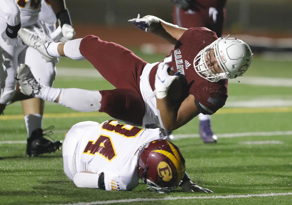 Ocean View running back Jonathan Gonzalez dives into the end zone for a touchdown on Friday.