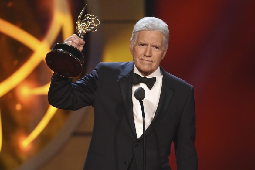 Alex Trebek accepts the award for outstanding game show host for "Jeopardy!" at the 46th annual Daytime Emmy Awards at the Pasadena Civic Center on Sunday, May 5, 2019, in Pasadena, Calif. (Photo by Chris Pizzello/Invision/AP)