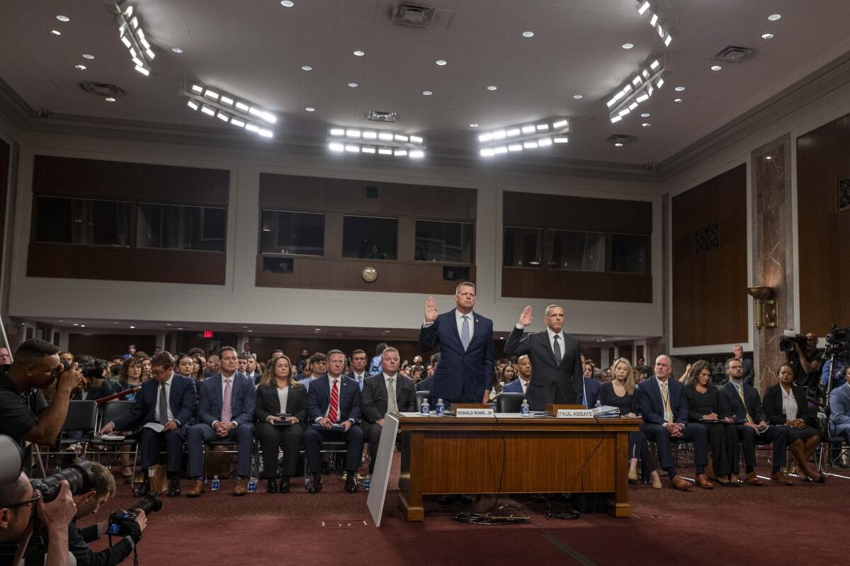 Acting Secret Service Director Ronald Rowe, left, and FBI Deputy Director Paul Abbate appear before a Senate hearing.