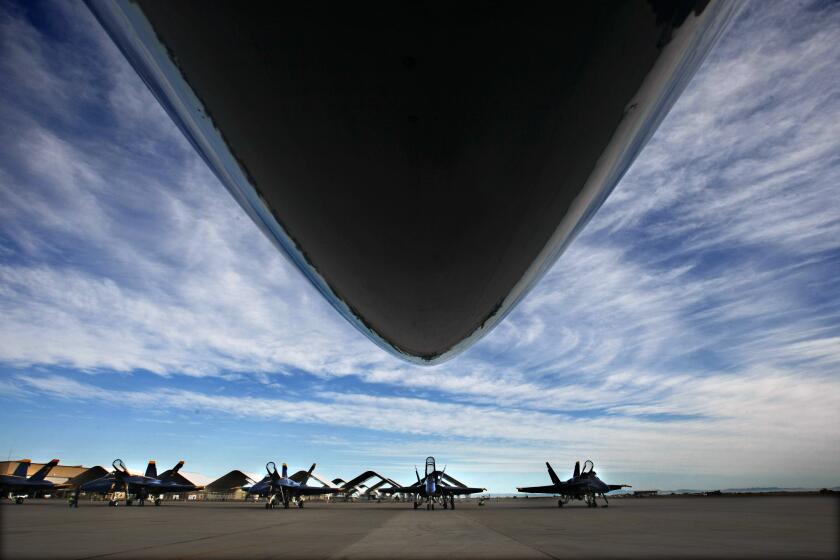 Bartletti, Don –– B581094723Z.1 MARCH 3, 2011. EL CENTRO, CA. The Blue Angels highly polished and maintained FA–18 Hornet jets sit ready for takeoff on the flight line at Naval Air Facility in El Centro, CA. (Don Bartletti / Los Angeles Times)