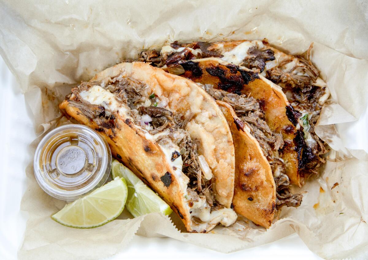 The quesabirria tacos from La Olla at Blossom Market Hall in San Gabriel.