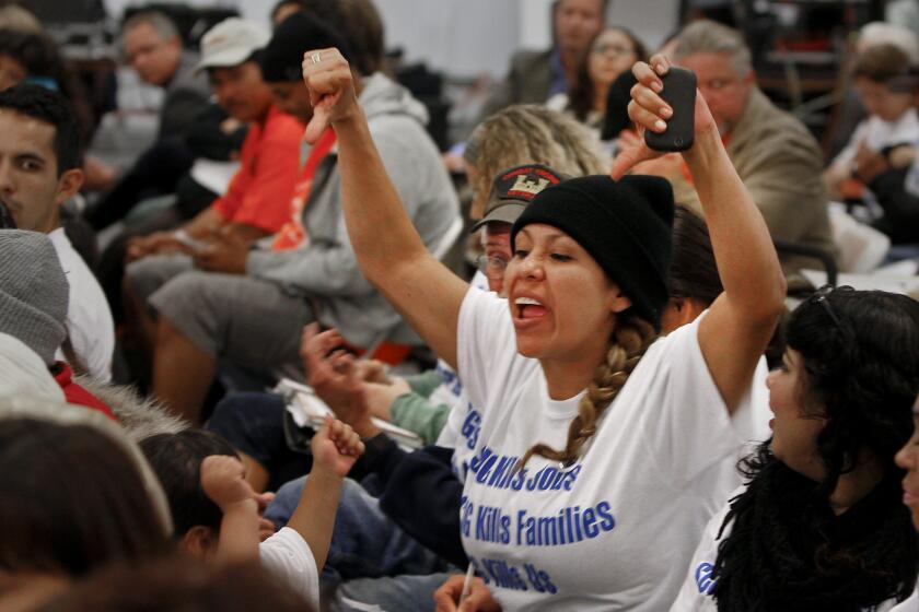 Emotions ran high in March 2013 during a public hearing for a $500-million rail yard planned near low-income, mostly minority neighborhoods in west Long Beach.