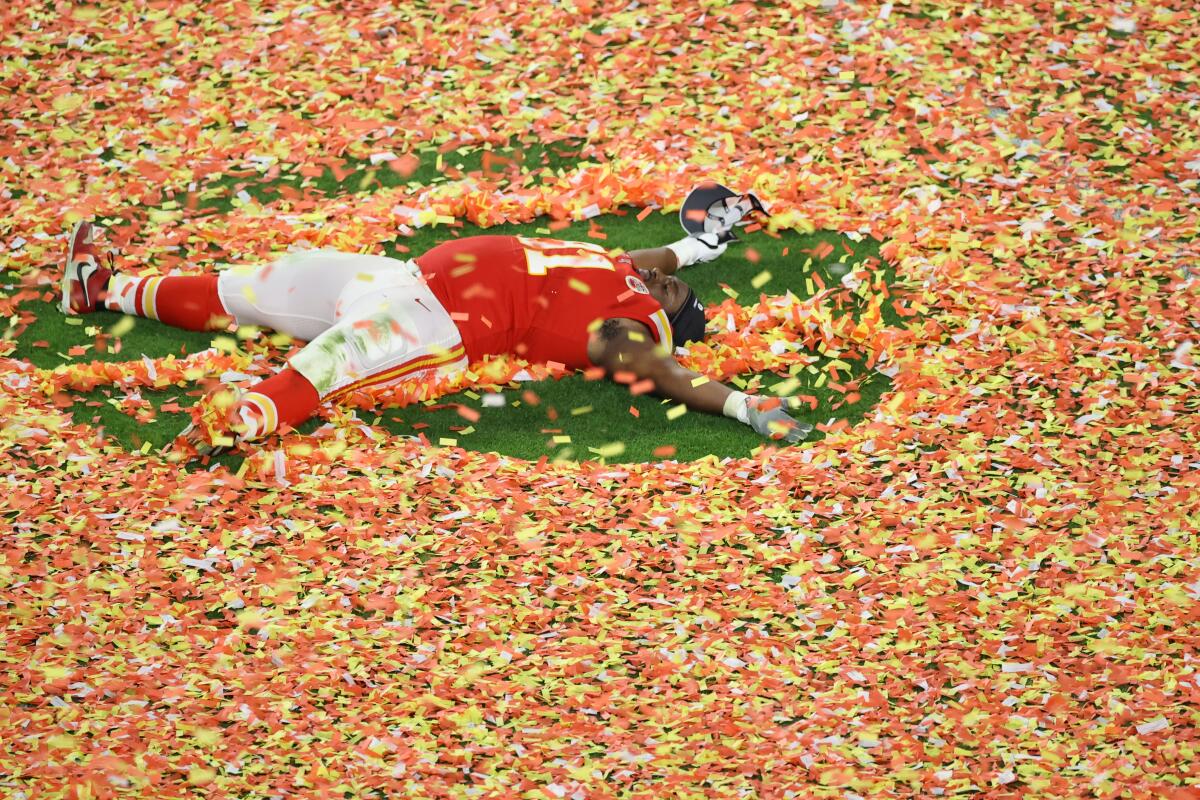 Derrick Nnadi of the Kansas City Chiefs creates a confetti angel after the victory.