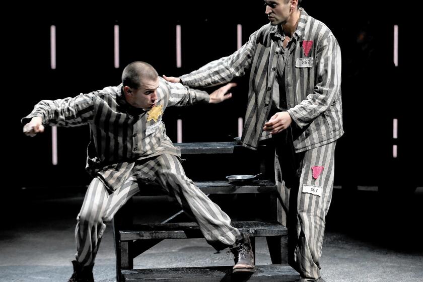 Martin Sherman’s gay Holocaust drama “Bent” dramatizes the horror of a human classification system in which certain groups are deemed subhuman, unworthy even of life. Patrick Heusinger, left, and Charlie Hofheimer perform in the Mark Taper Forum production.