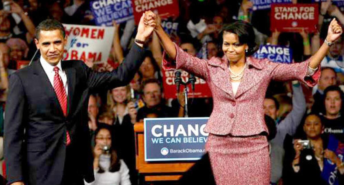 Democratic presidential candidate Sen. Barack Obama (D-IL) and his wife Michelle celebrate victory in the South Carolina primary.