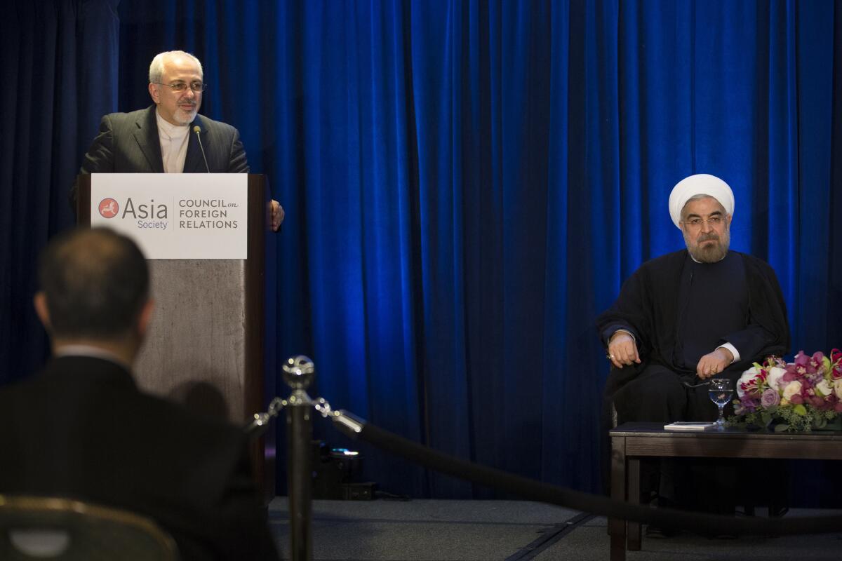 Iranian Foreign Minister Mohammad Javad Zarif talks about his meeting with U.S. Secretary of State John Kerry during an address and discussion hosted by the Asia Society and the Council on Foreign Relations in Manhattan.