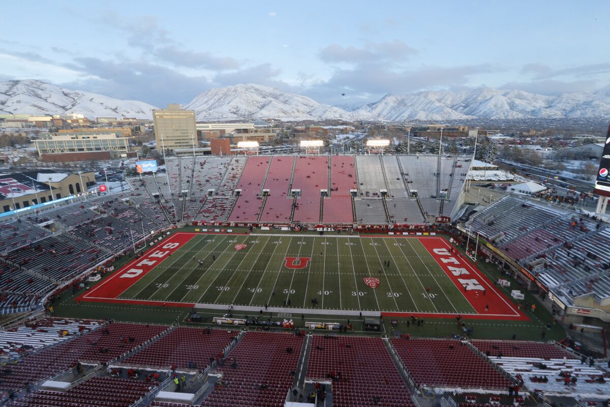 FILE - Rice-Eccles Stadium is shown before the start of an NCAA college football game between Colorado and Utah Saturday, Nov. 30, 2019, in Salt Lake City. Losing college football stings across America. While every aspect of society has been jarred by a worldwide pandemic that has claimed more than 160,000 American lives, the potential loss of college football feels like another collective punch to the national psyche. (AP Photo/Rick Bowmer, File)