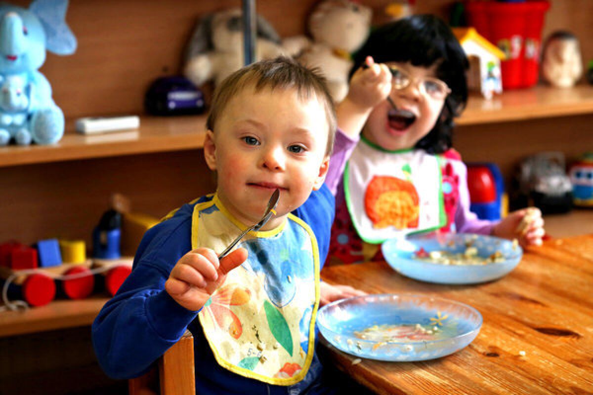 Lunchtime at Baby Home No. 13 in St. Petersburg, Russia. Timofey, front, has enjoyed his soup already.
