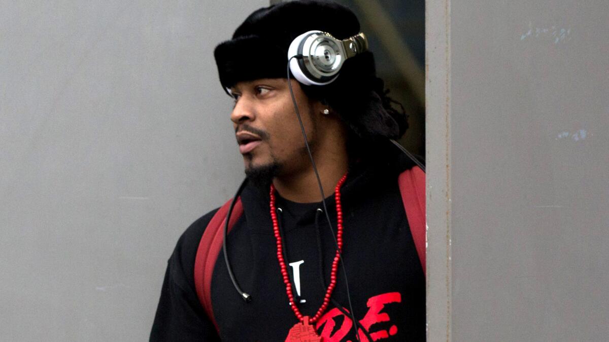 Seahawks running back Marshawn Lynch leaves the team's training facility to travel to Carolina for Sunday's playoff game against the Panthers.