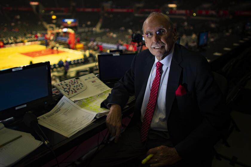 LOS ANGELES, CA - DECEMBER 22, 2018: LA Clippers long time broadcaster Ralph Lawler prepares before the start of the game against the Denver Nuggets at Staples Center on December 22, 2018 in Los Angeles, California. He is retiring at the end of the season.(Gina Ferazzi/Los AngelesTimes)