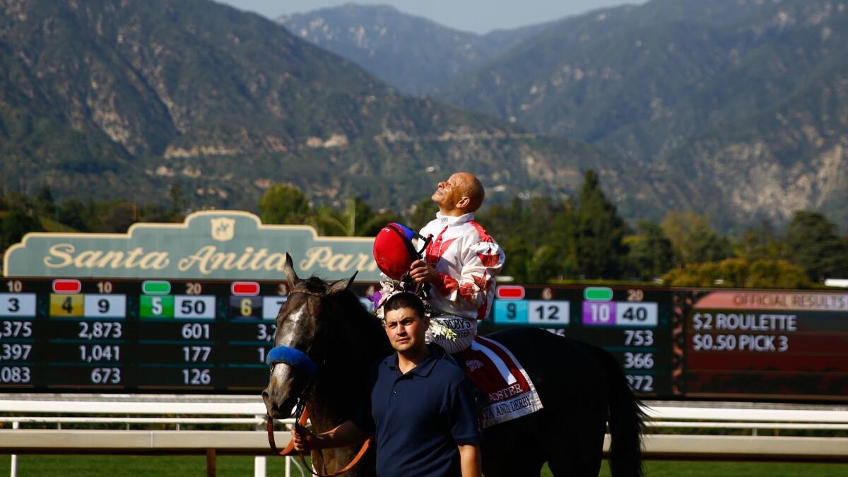 Jockey Mike Smith led Roadster to a first-place finish in the Santa Anita Derby.