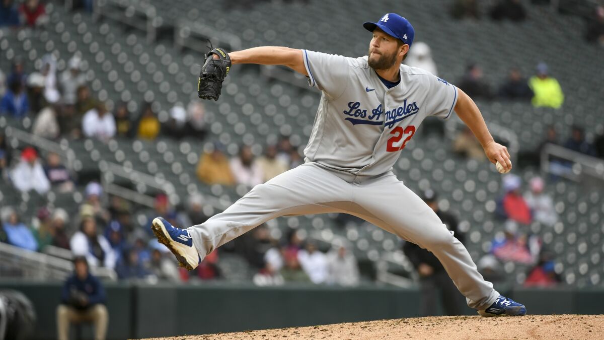 Dodgers starter Clayton Kershaw delivers a pitch against the Minnesota Twins.