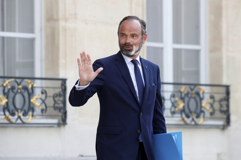 FILE - In this Wednesday, June 3, 2020 file photo, French Prime Minister Edouard Philippe leaves after a meeting at the Elysee Palace in Paris. The French Presidency announced on Friday, July 3, 2020 that Philippe has resigned and a government reshuffle is expected in the coming days. (Gonzalo Fuentes/Pool via AP, File)