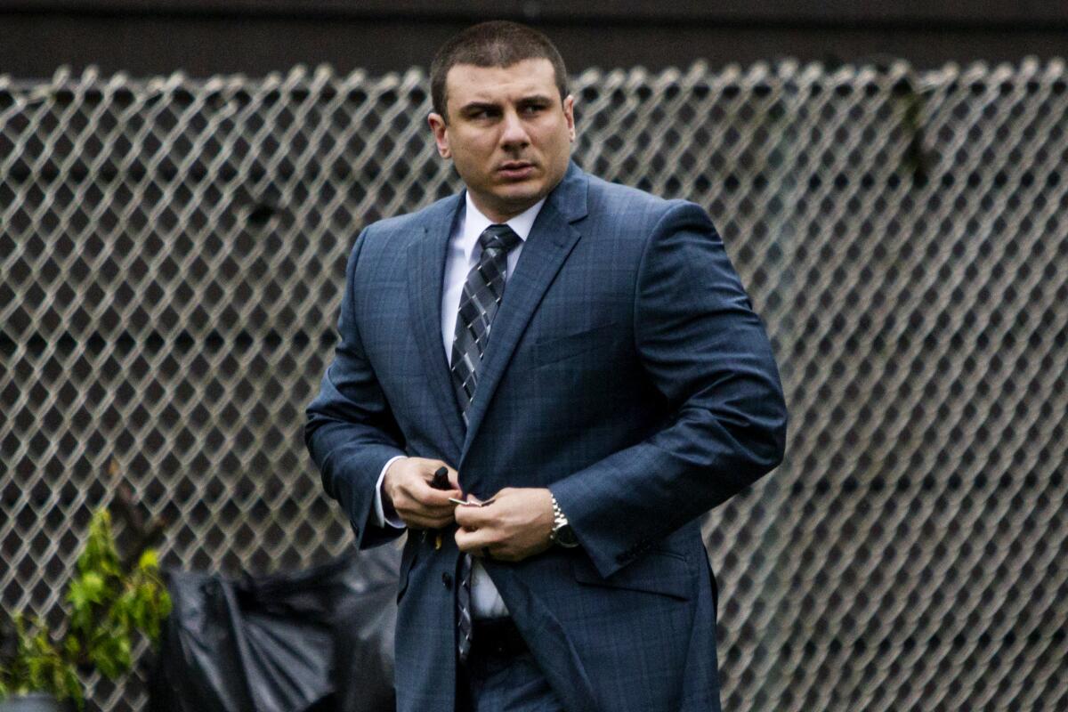 FILE - In this May 13, 2019, file photo New York City police officer Daniel Pantaleo leaves his house Monday, May 13, 2019, in Staten Island, N.Y. New York City’s police commissioner has scheduled a midday news conference as the city waits for his decision on whether to fire Pantaleo, a police officer involved in the 2014 death of an unarmed black man. Police commissioner James O’Neill said he would make an announcement at 12:30 p.m. Monday, Aug. 19, on an undisclosed topic. (AP Photo/Eduardo Munoz Alvarez, File)