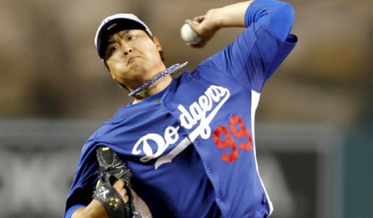 South Korean pitcher Hyun-Jin Ryu retired all 12 Angels batters he faced in the Dodgers' 3-0 victory in the first of three exhibition games in the Freeway Series.