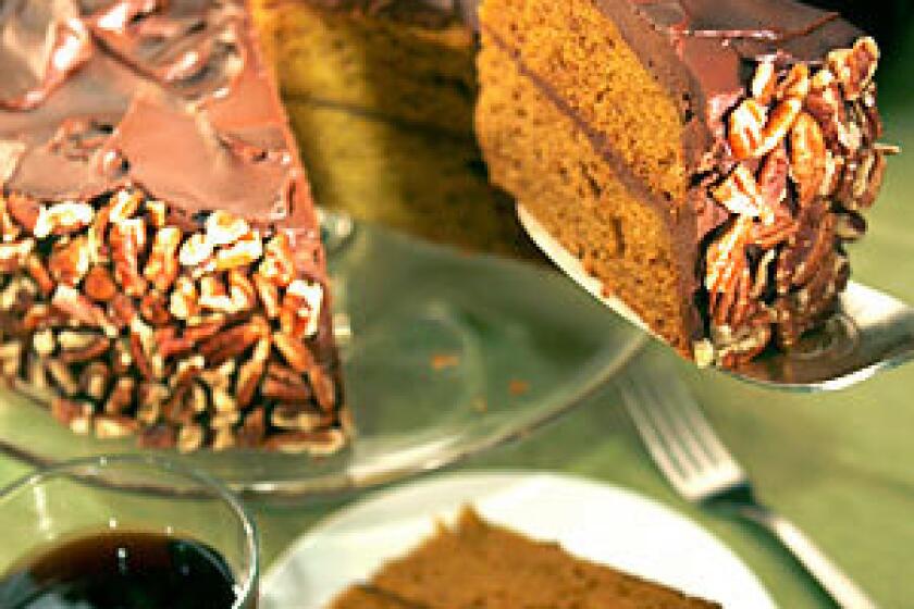 DARING DUO: Pumpkin and chocolate make a unique pairing in moist cake iced with sour cream-laced ganache.