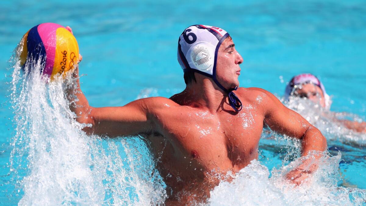 Newport Harbor High alumnus Luca Cupido, shown here competing in last year's Olympics, scored four goals for Team USA against Russia at the FINA World Championships.