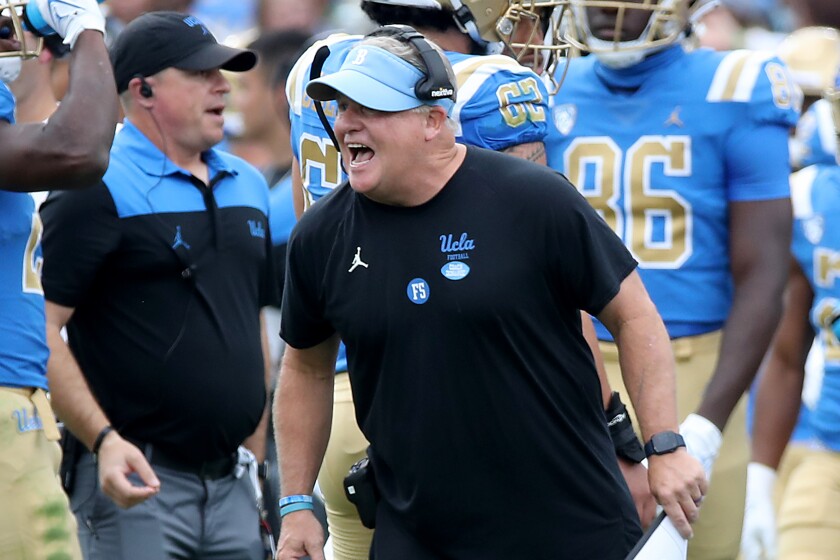 PASADENA, CALIF. - OCT. 23, 2021. UCLA head coach Chip Kelly yells instructions to his team.