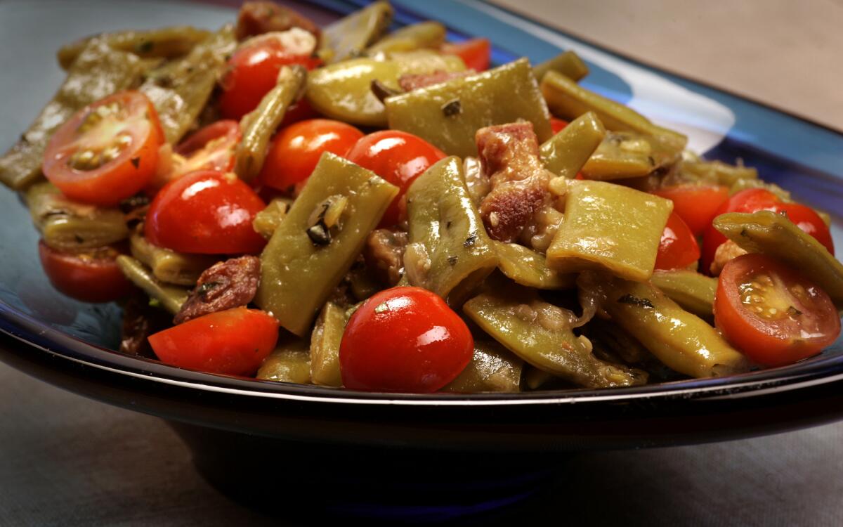 Braised Romano beans with pancetta and cherry tomatoes