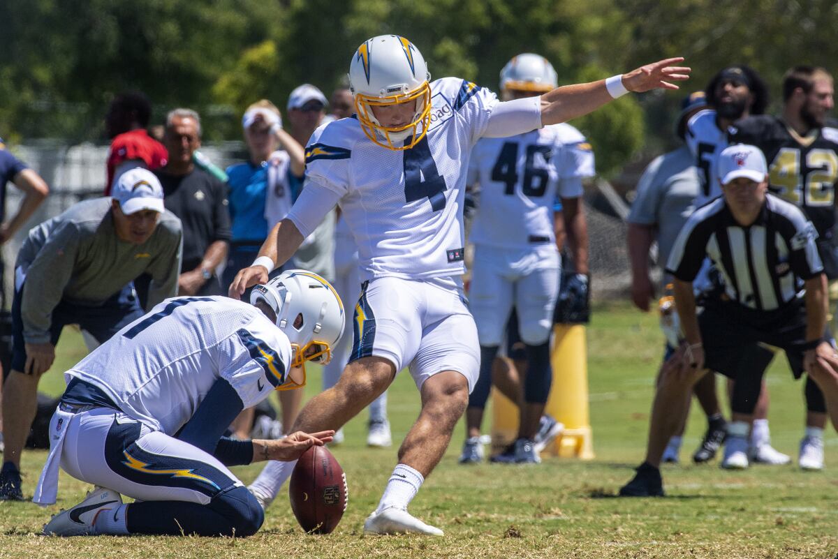 Chargers kicker Michael Badgley attempts a field goal during a team practice session in August.