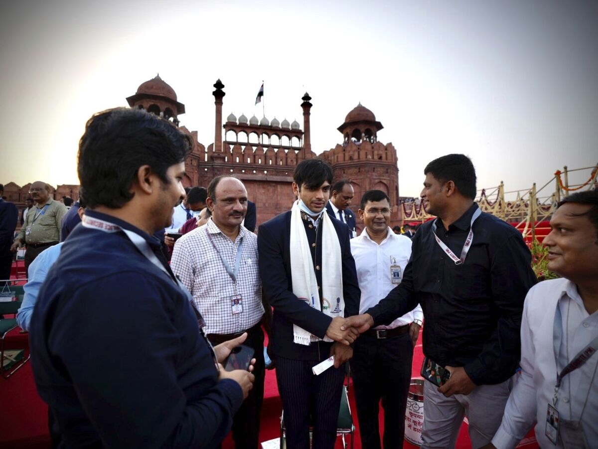 Olympic medalist Neeraj Chopra, center, arrives for the Independence Day celebrations at the historic 17th century Red Fort in New Delhi, India, on Sunay, Aug. 15, 2021. India commemorates its 1947 independence from British colonial rule on Aug. 15. (AP Photo/Manish Swarup)