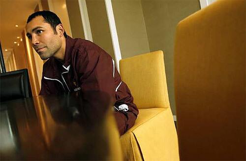 De La Hoya relaxes in his hotel room, getting ready for the weigh-in Friday.