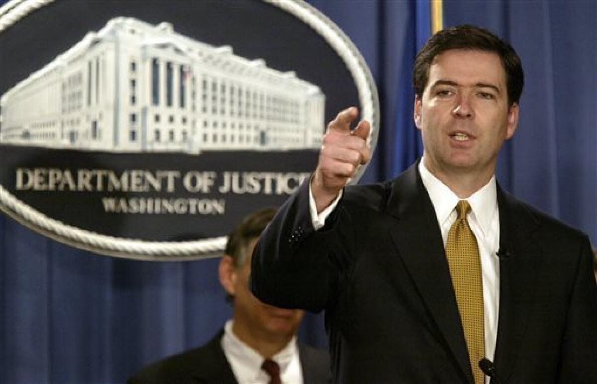 Then-Deputy Atty. Gen. James Comey at a 2004 news conference in Washington. President Obama is preparing to nominate Comey to lead the FBI.