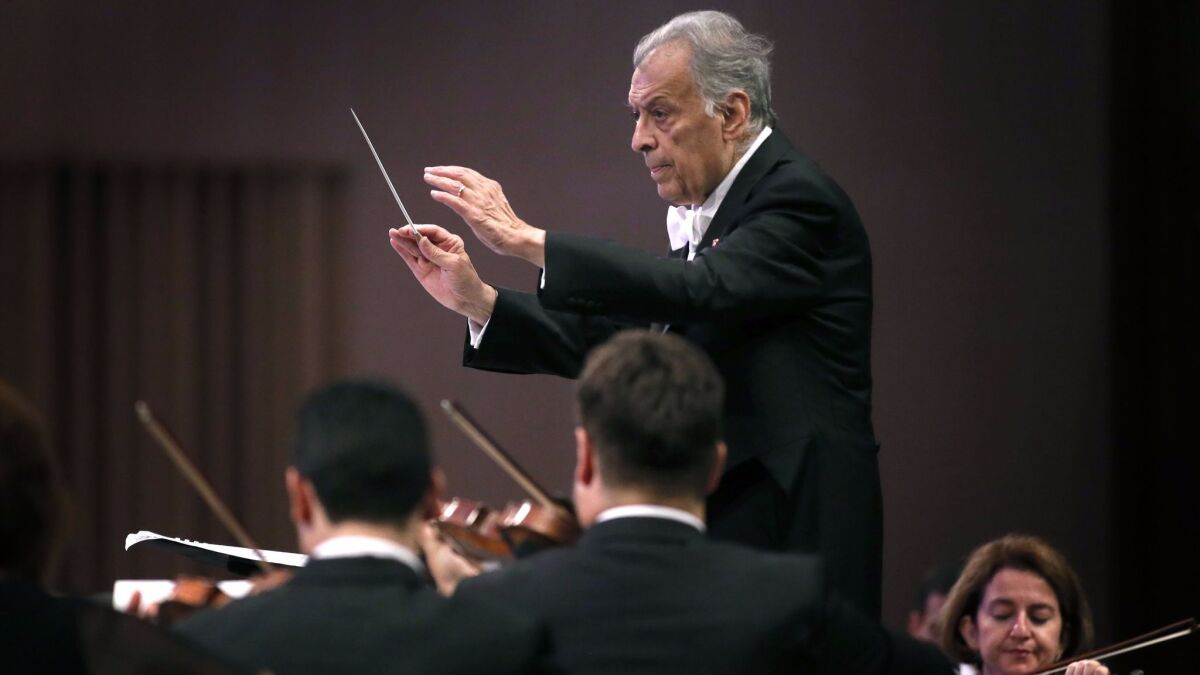 Zubin Mehta conducts the Israel Philharmonic Orchestra last month in Bucharest, Romania. The orchestra's tour moves from L.A. to San Francisco, then Santa Barbara, Miami and New York.