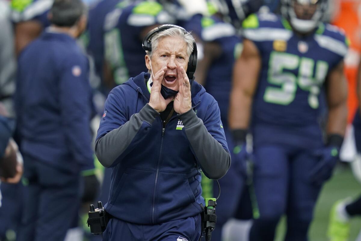Seahawks coach Pete Carroll yells instructions from the sideline.